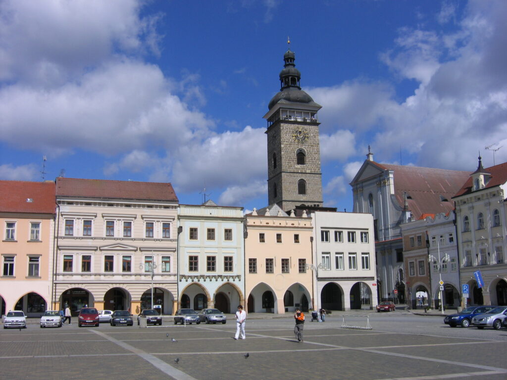 Black Tower stands over Přemysl Otakar II Square in České Budějovice. It's construction is in contrast to the square below. It's much more rustic.