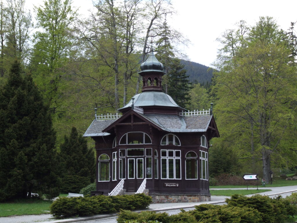 A small, ornate wooden building in Karlova Studánka. Wheely Tyred Czech Silesia attractions