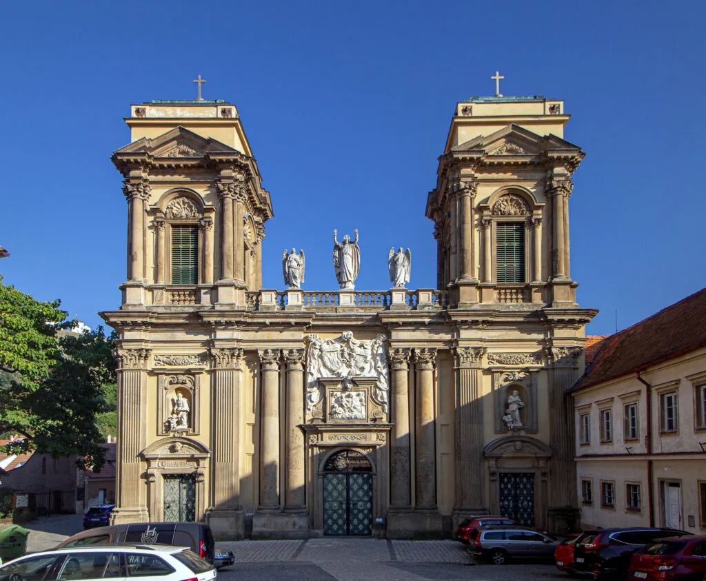 Three statues stand on top of what looks like a church in Mikulov. It's a tomb for a wealth family