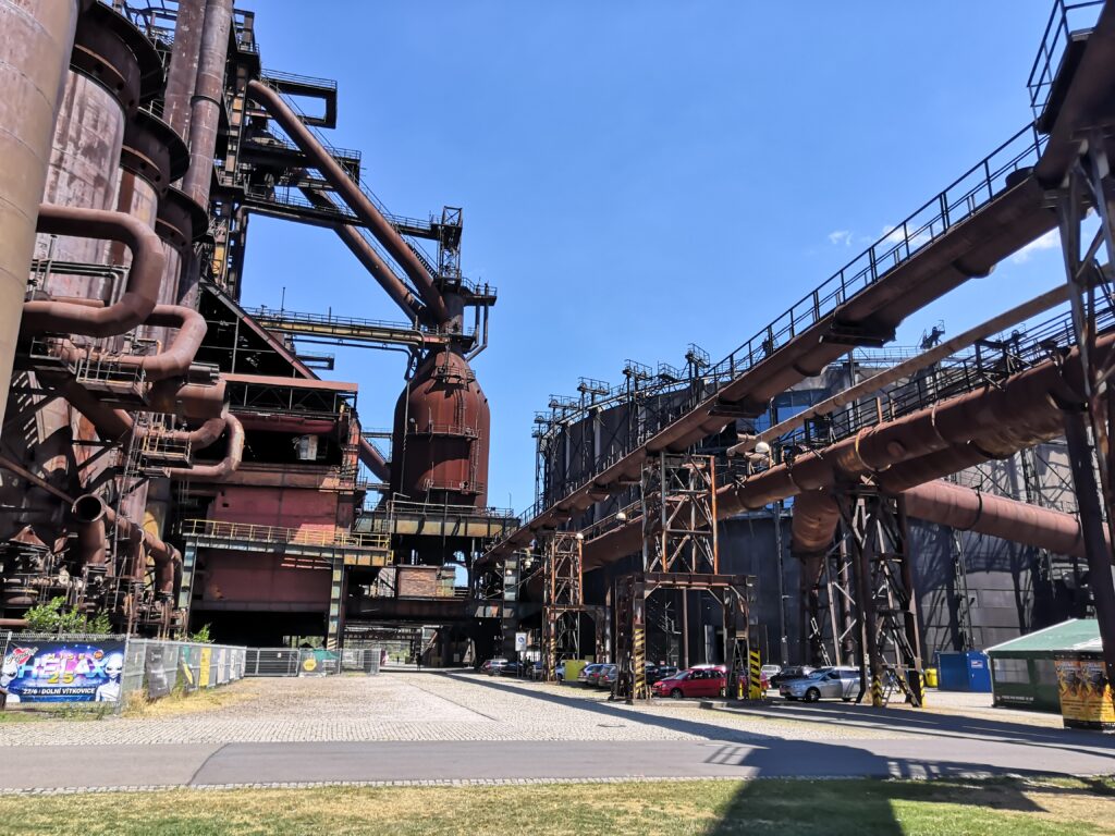 The exterior of the Vítkovice ironworks. Pipes and blast furnaces are everywhere.