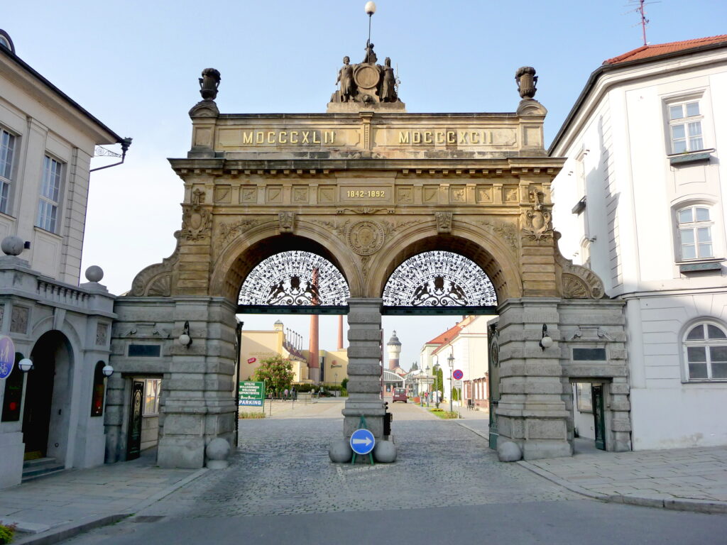 The two arches of the main gate to the Pilsner Urquell Brewery in Plzeň.