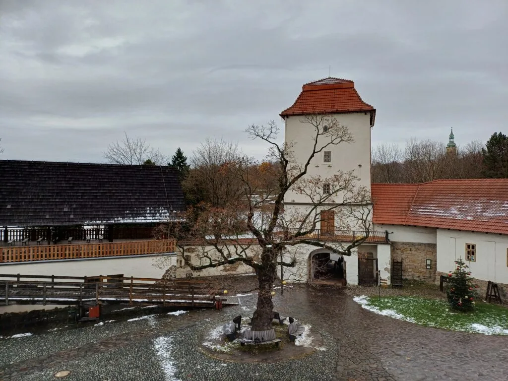 The Silesian Ostrava Castle is a white building with a red roof, perhaps a bit smaller than you'd expect