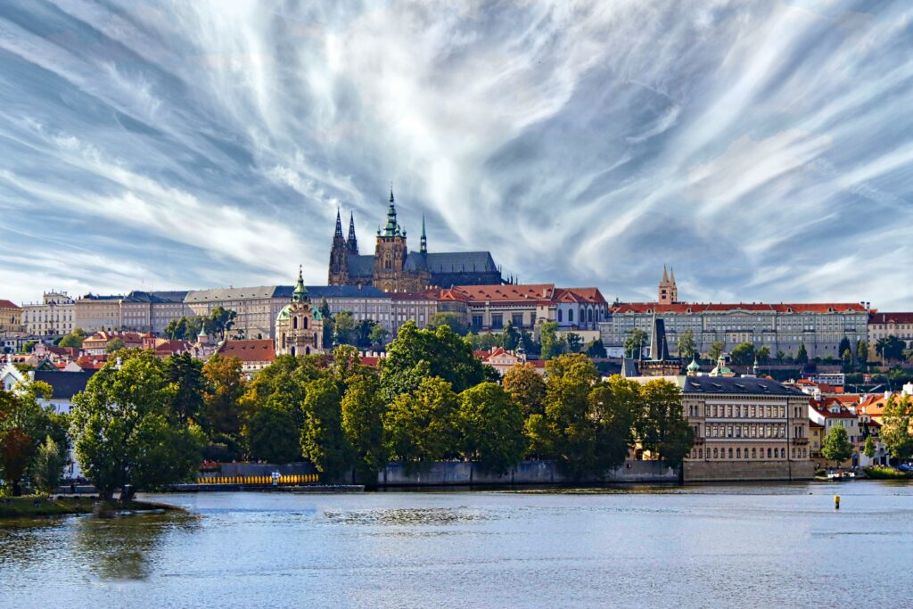St Vitus Cathedral and Prague Castle tower over the Vltava River. Wheely Tyred Best bars in Prague