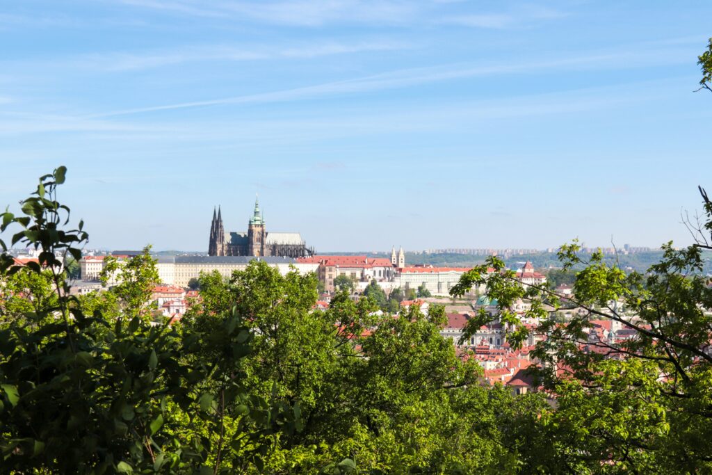 St Vitus Cathedral can be seen through trees from Petrin Tower