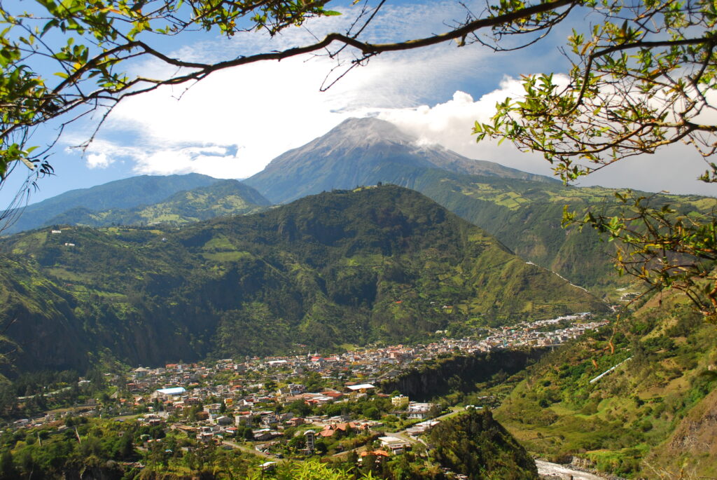 Volcan Tungurahua above the city of Baños, Ecuador.