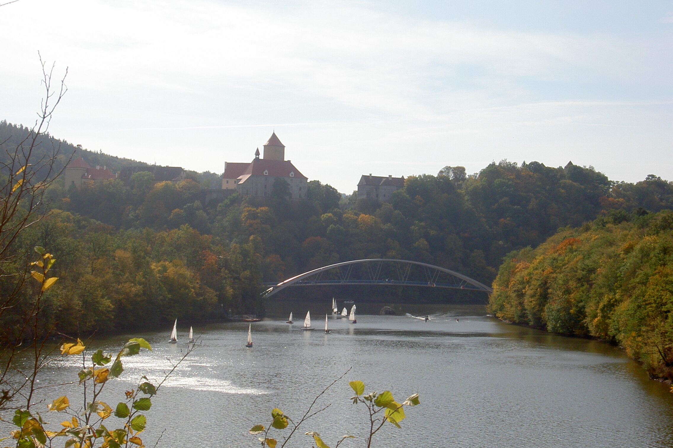 Veveří Castle can be seen across Brno reservoir, which is full of small boats. Wheely Tyred moravia