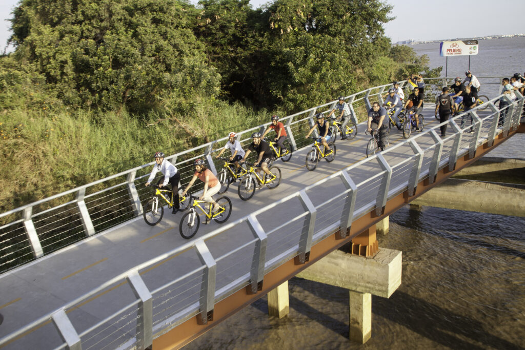 Cyclists cross a bridge on the way to Isla Santay in Ecuador. Wheely Tyred Guayaquil’s hidden gems