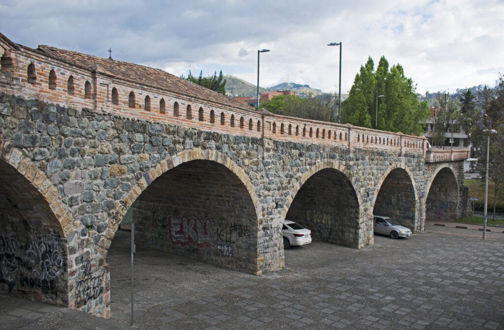 The Puente Roto, or broken Bridge, stretches out to the Tomebamba River where it stops, in Cuenca, Ecuador. Wheely Tyred Hidden Gems in Cuenca
