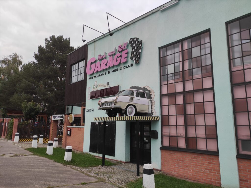 The Rock & Roll Garage in Ostrava, Czechia, has a Trabant crashing through a wall above the door.