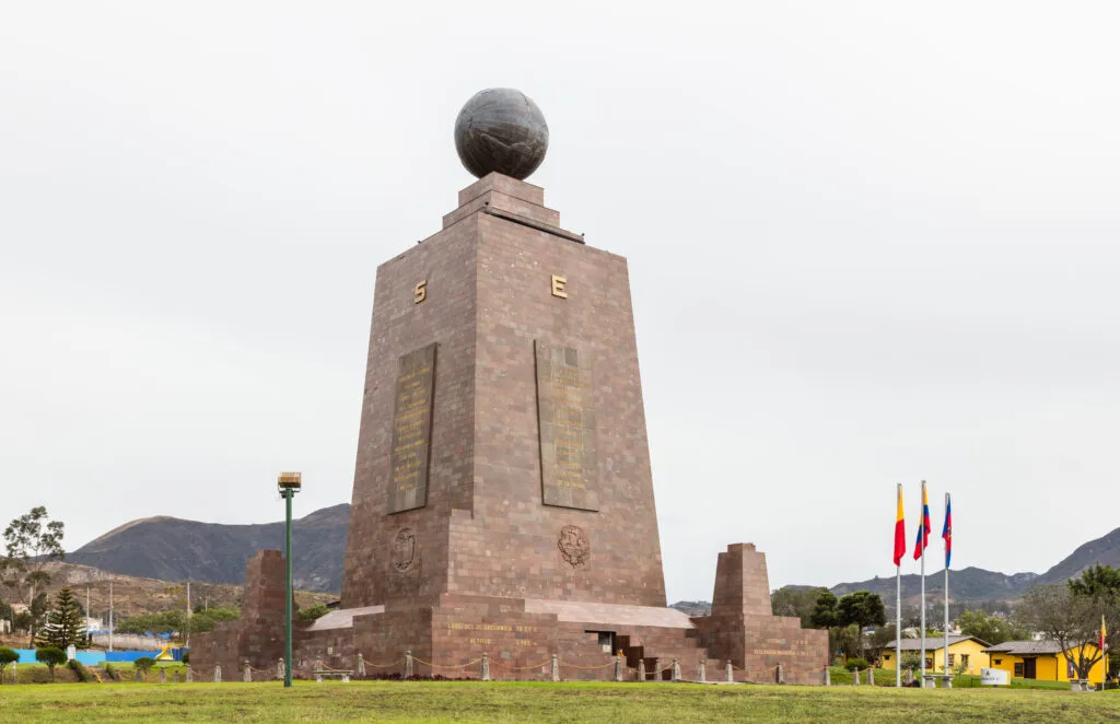 The huge monument with a globe on top at Mitad del Mundo, Quito, Ecuador.