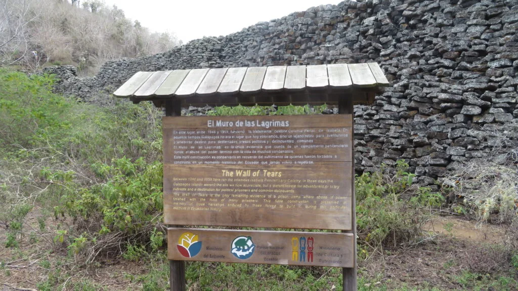An information board in front of the Wall of Tears (Muro de las Lágrimas), on Isabela Island
