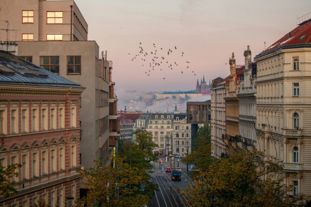 Prague Castle can be seen from the neighbourhood of Vinohrady in Prague on a foggy day. Wheely tyred Campsites in Prague