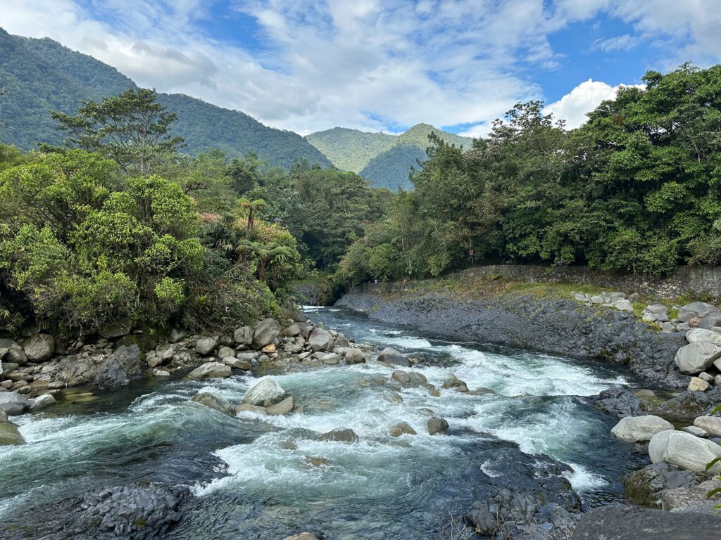 The Rio Negro flows through the mountainous forests near Baños, Ecuador.
