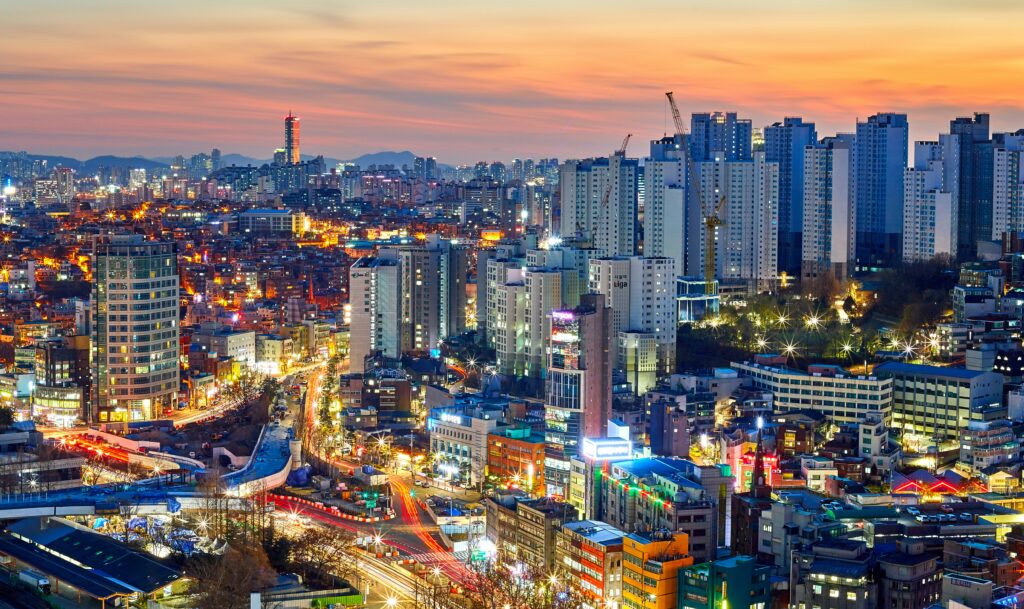 Skyscrapers fill the horizon in a cityscape of Seoul, South Korea, around sunset. Wheely Tyred safe streets