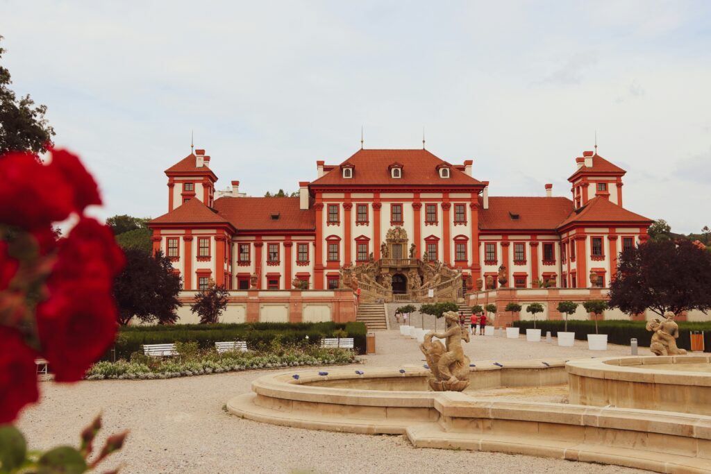 Troja Castle near Prague with a fountain in front on a grey day