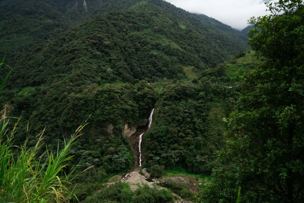 A waterfall tumbles through the forest near Baños, Ecuador.