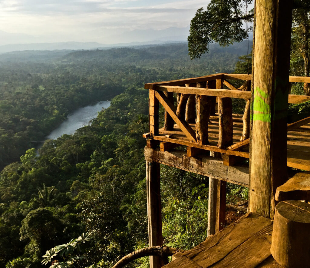 The Pastaza River can be seen through the Amazon Rainforest from a wooden hut near Ecuador. Top attractions in Puyo