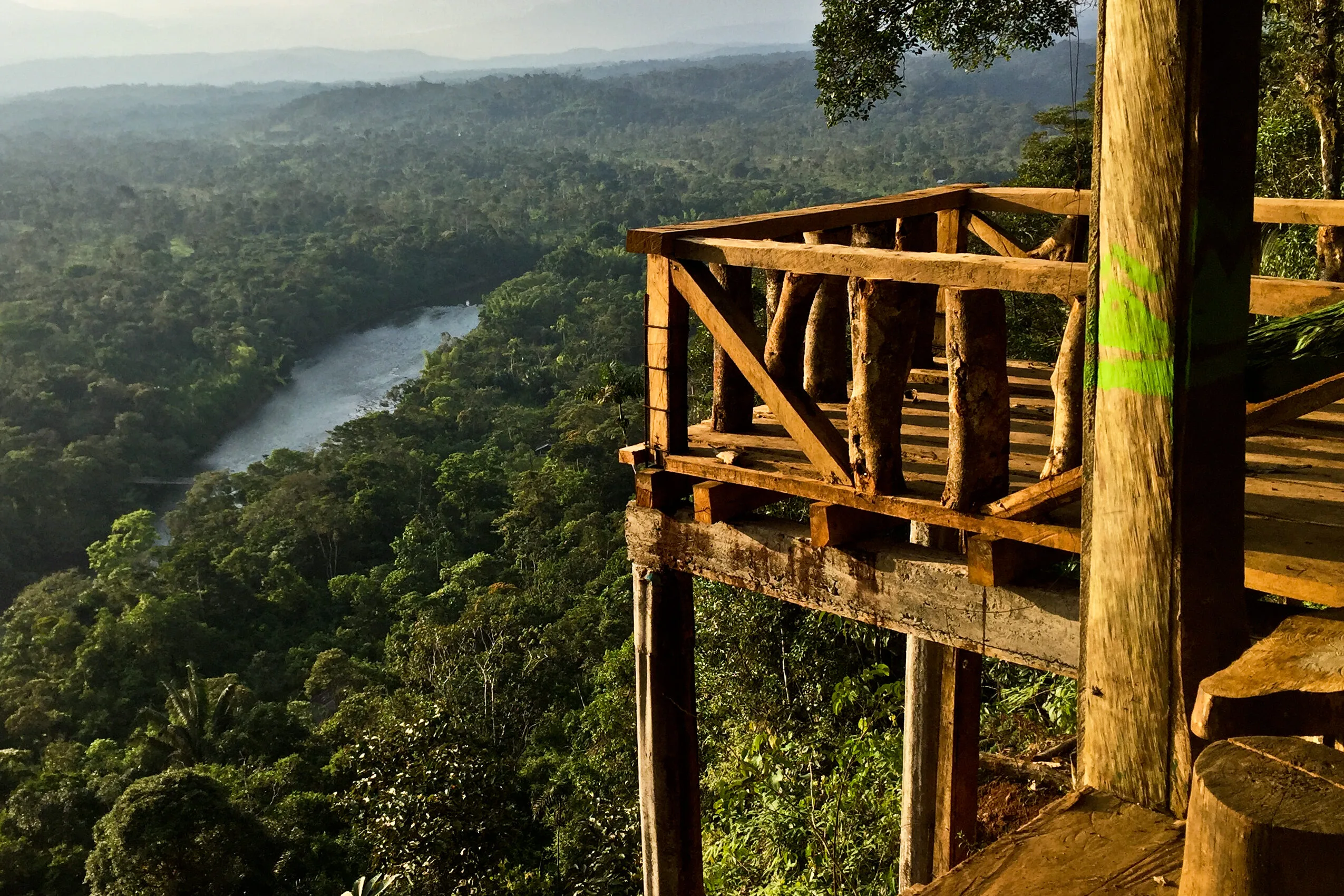 The Pastaza River can be seen through the Amazon Rainforest from a wooden hut near Puyo, Ecuador.