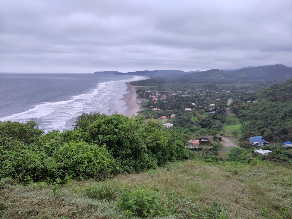 Waves roll onto a long beach in Ayampe, Ecuador.