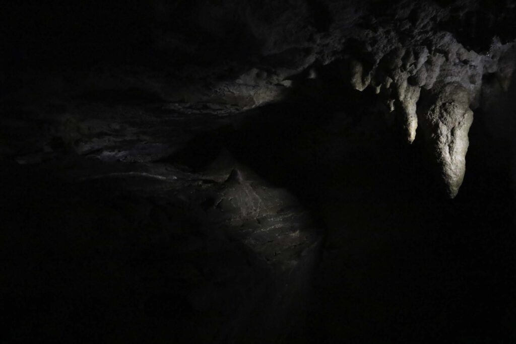 Stalctites can be seen in the dark in Jumandy Caves, Tena, Ecuador.