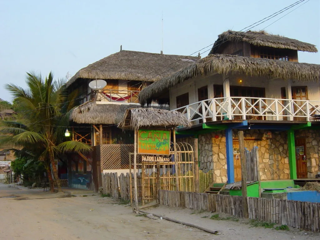 A brightly coloured wooden hotel in Montañita, Ecuador. Wheely Tyred Ecuadorian Coast
