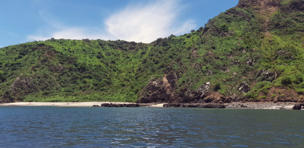 Salango Island rises out of the Pacific Ocean off the coast of Ecuador.