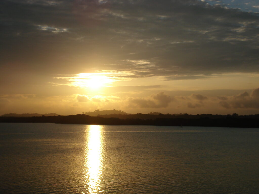 The sun sets over the water near San Lorenzo, Ecuador.