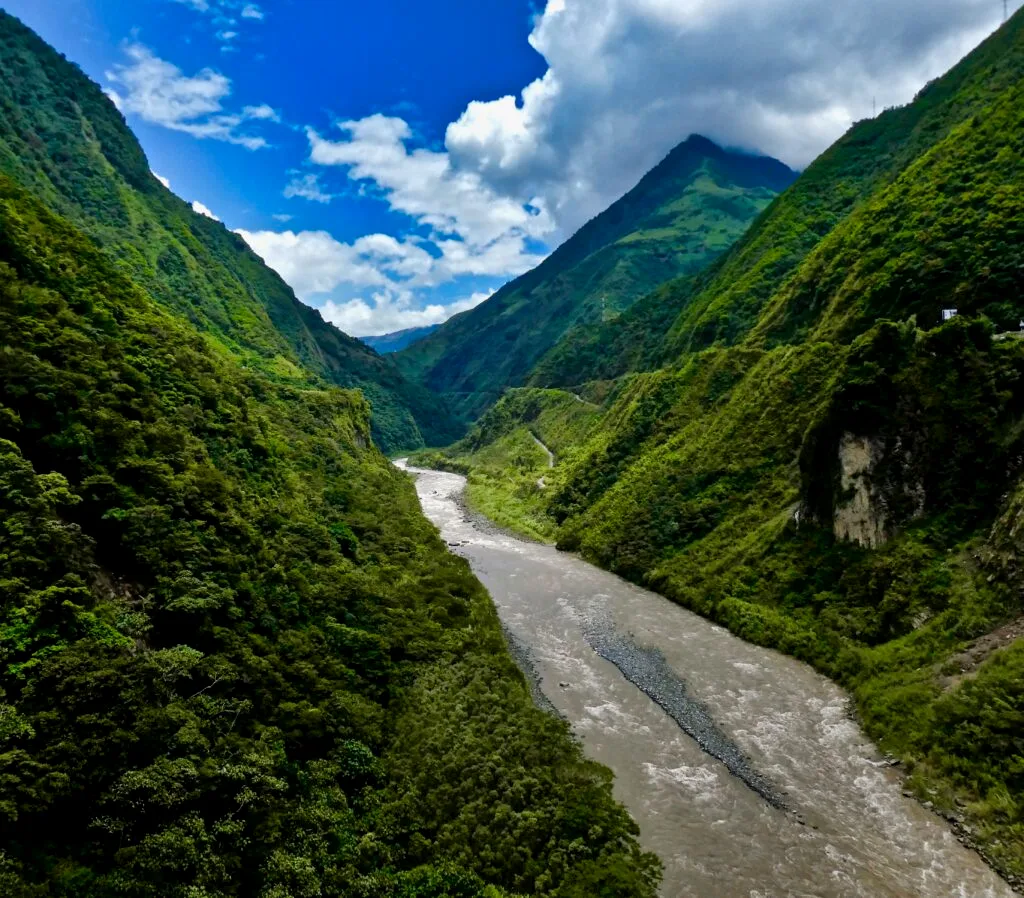 The Psataza River flows through a huge wooded valley in Ecuador. Wheely Tyred Best restaurants in Puyo