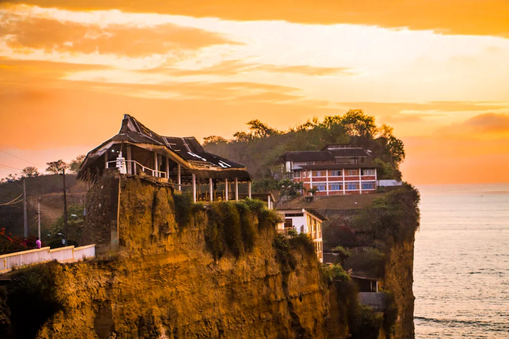 The Santuario Blanca Estrella Del Mar rises above the ocean on a cliff in Olón, Ecuador.