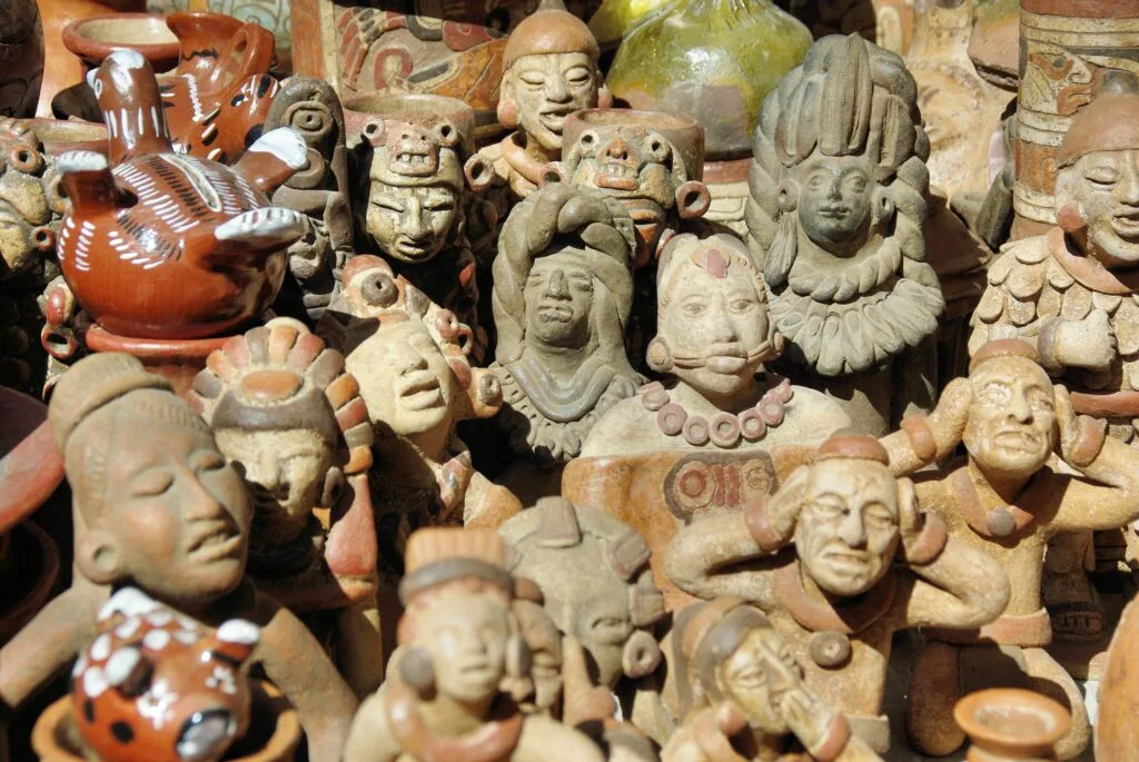 The frame is full of indigenous pottery made in Otavalo, Ecuador.
