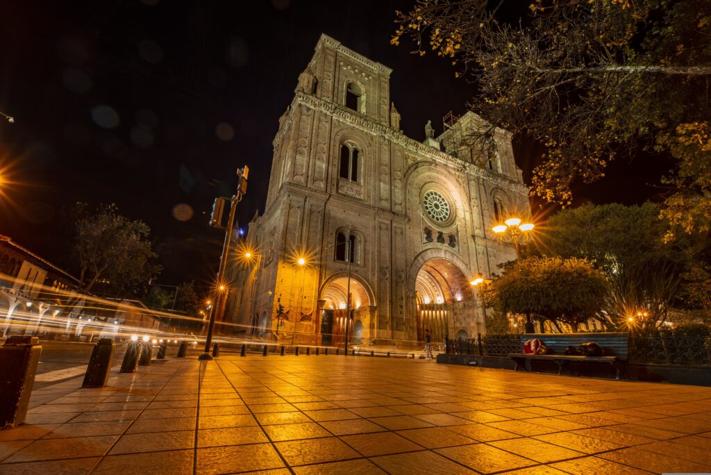 The New Cathedral is lit up at night in Cuenca, Ecuador.