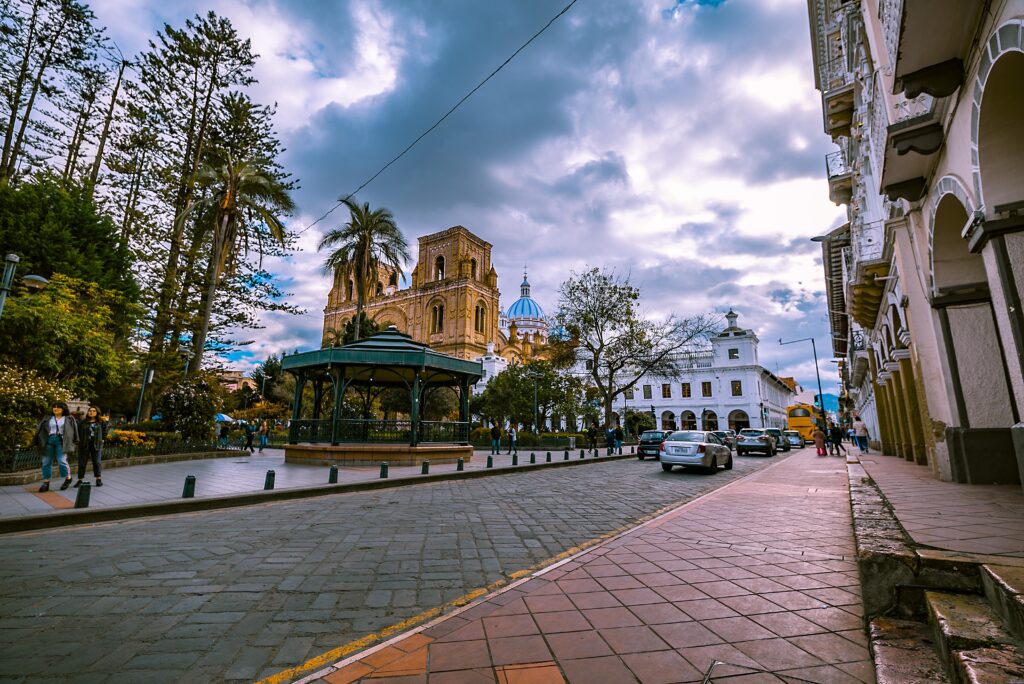 The New cathedral can be seen through Parque Calderon in Cuenca, Ecuador.