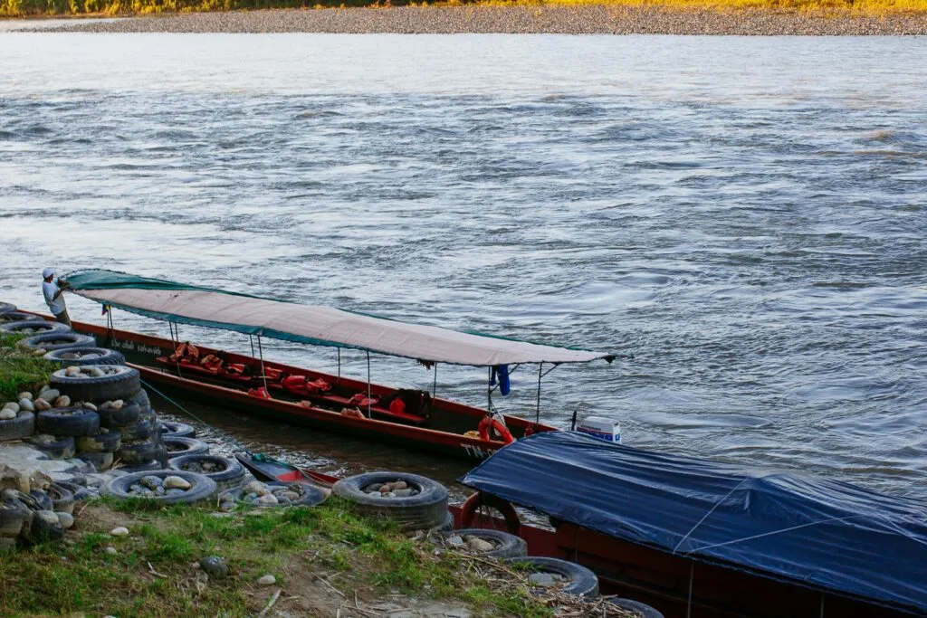 A boat floats in the Napo River near Tena, Ecuador.