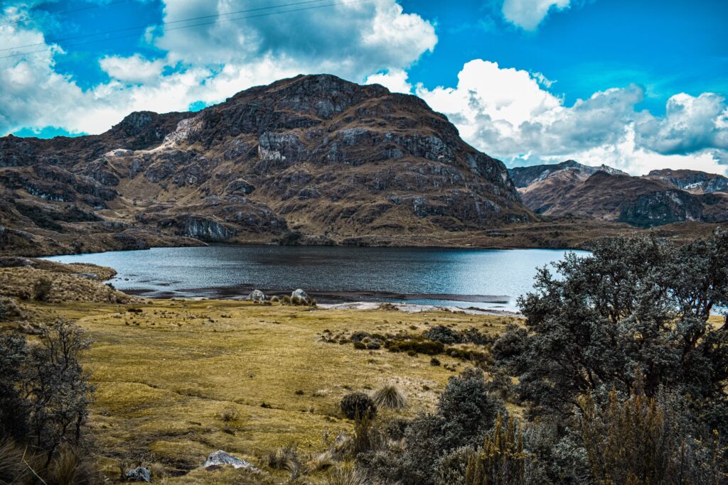 A lake and mountainside at Cajas National Park, near Cuenca, Ecuador. Wheely Tyred What to eat in the Ecuadorian Sierra