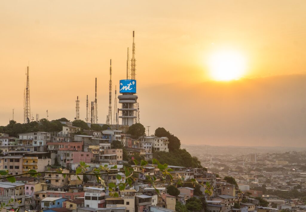 An aerial shot of a hill covered in houses and a TV tower in Guayaquil, Ecuador. Wheely Tyred