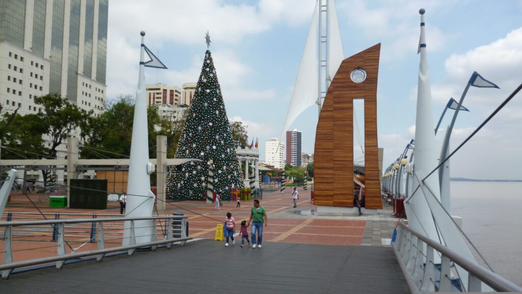 People walk along the Malecon 2000 by the River Guayas in Ecuador. Wheely Tyred Guayaquil travel guide