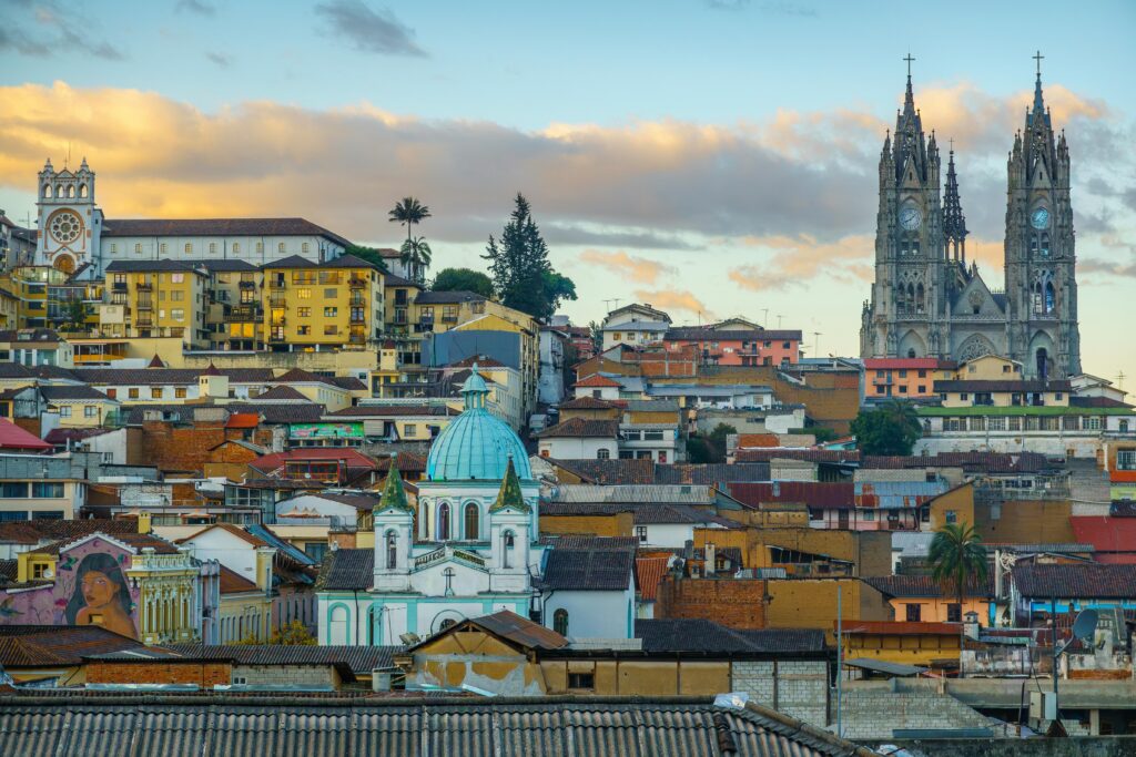 The Basílica del Voto Nacional is seen rising above Quito, Ecuador, from a distance.