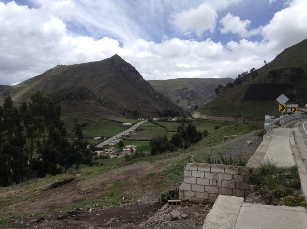 A road runs through a steep valley in Tigua,in the Andes near Quilotoa, Ecuador.