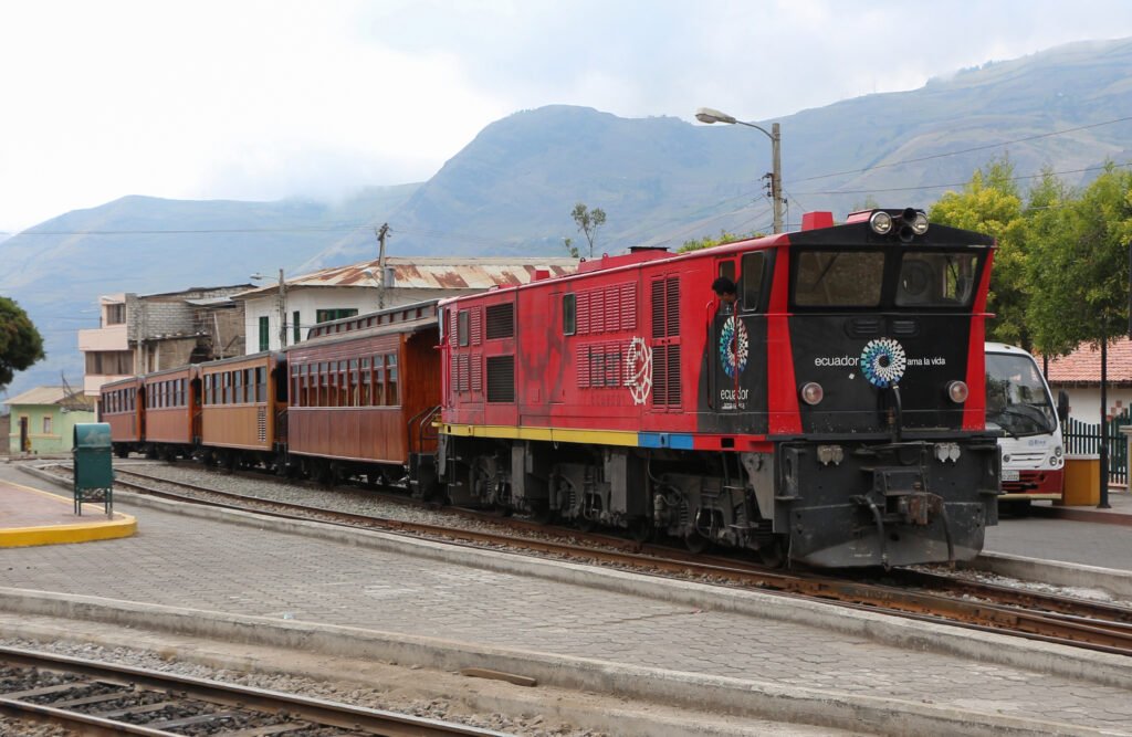 The Devil’s Nose Train pull carriages through the town of Alausí, Ecuador.