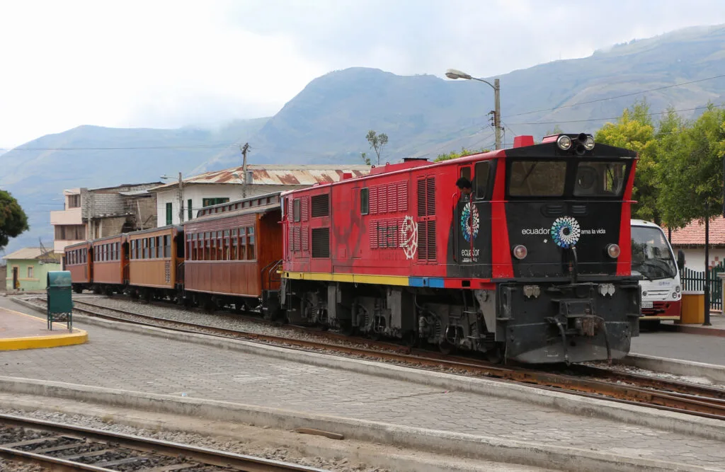 The Devil’s Nose Train pull carriages through the town of Alausí, Ecuador.