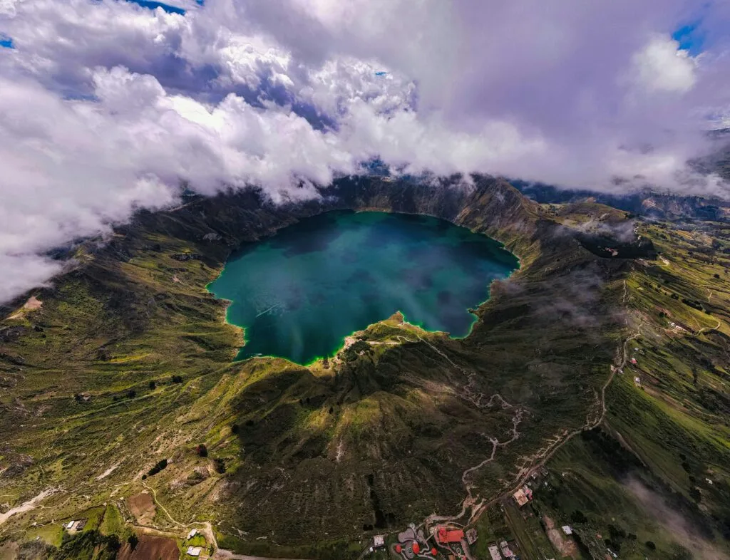 The caldera at Lake Quilotoa is full of blue water in Ecuador.