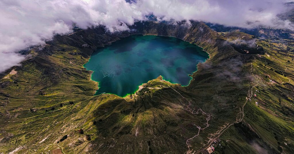 The caldera at Lake Quilotoa is full of blue water in Ecuador.