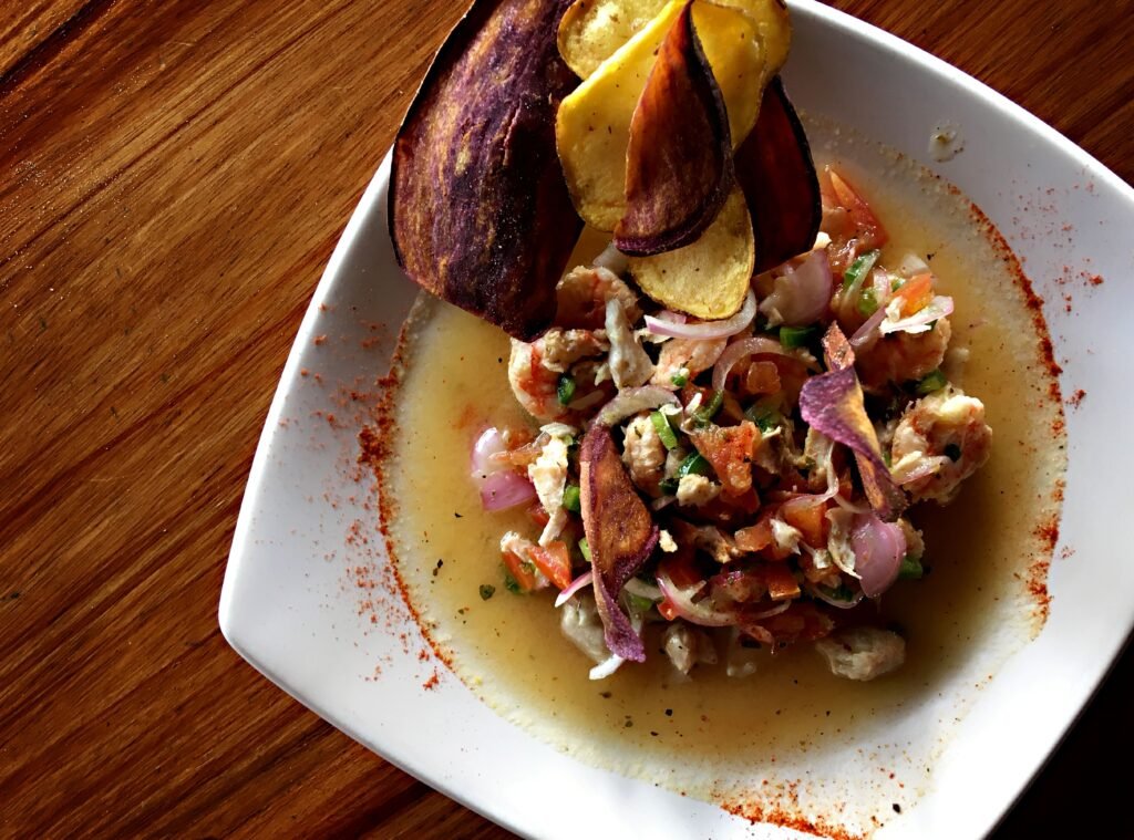 A plate of Ecuadorian ceviche, or cured seafood, with green plantain.