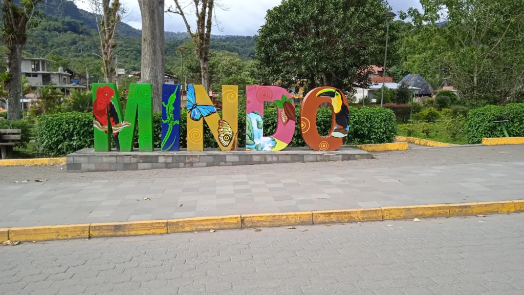 The multicoloured sign at the centre of Mindo, Ecuador