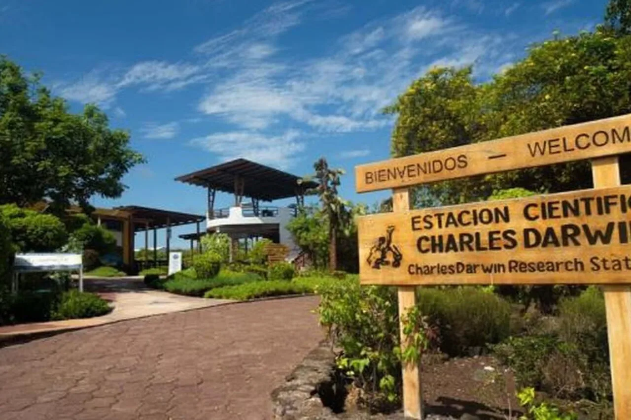 A wooden sign at the entrance to the Charles Darwin Research Center on Santa Cruz, Galápagos