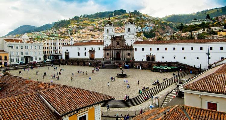 The Plaza of San Francisco with a huge white church rising out of it in Quito, Ecuador