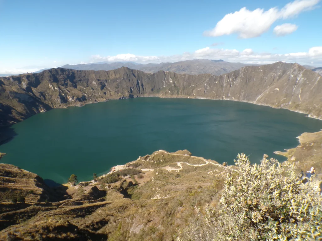 The caldera lake at Quilatoa is a deep teal in the sun