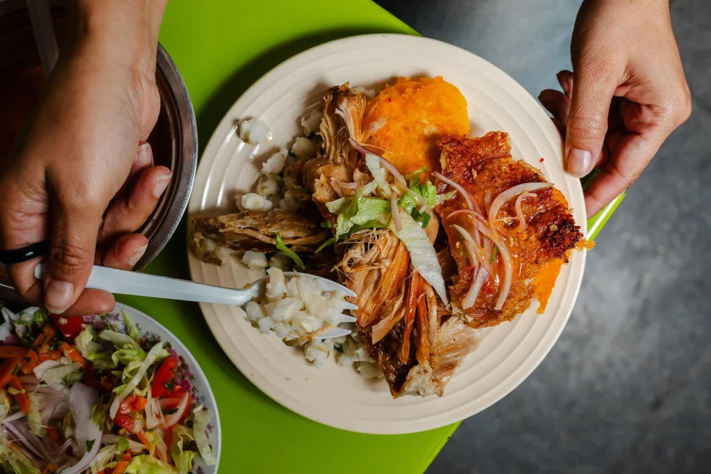 Hornado in a market in Cuenca, Ecuador