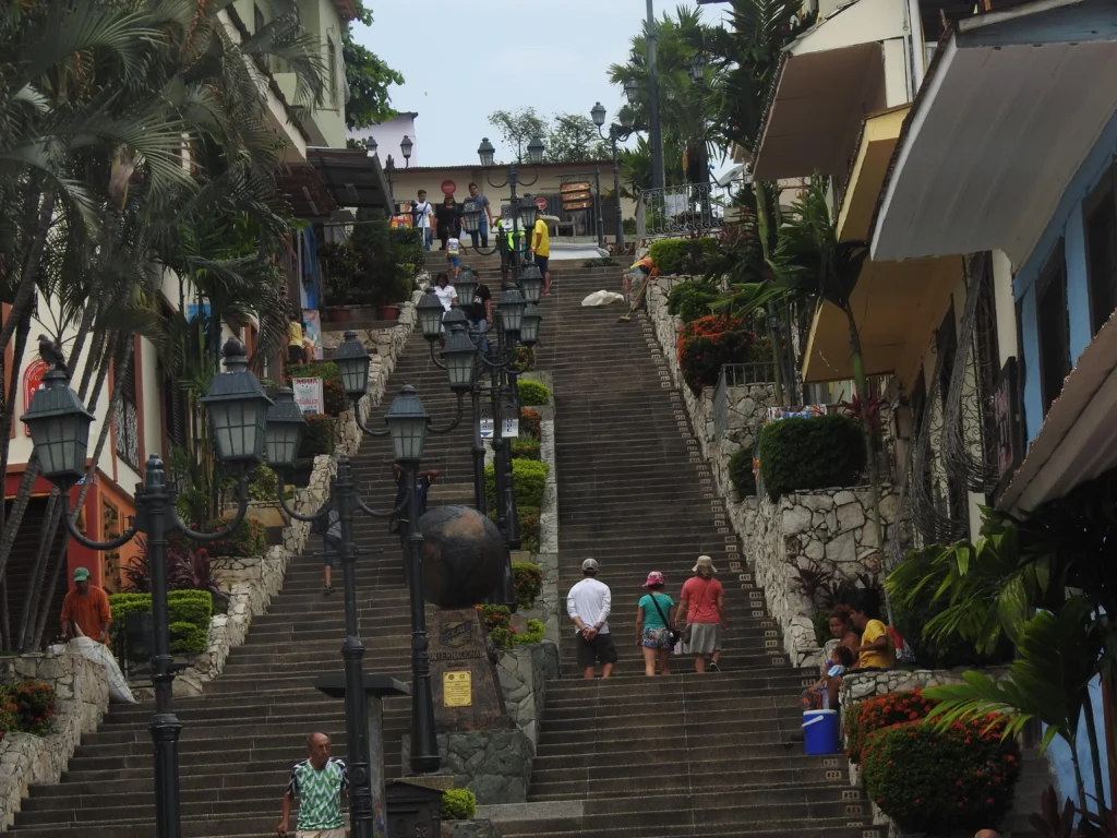 People climb the 440 steps of Las Peñas, Guayaquil, Ecuador