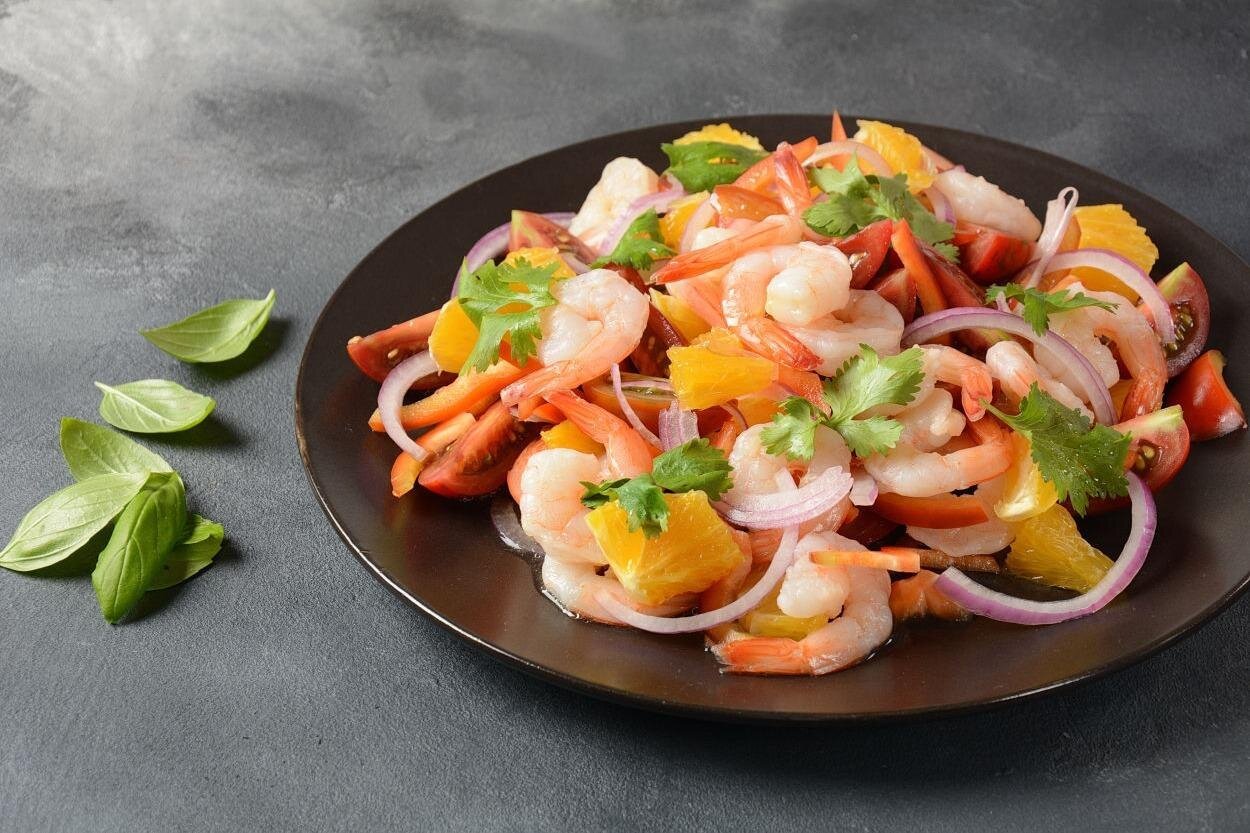 A plate of seafood on a grey table in Guayaquil, Ecuador